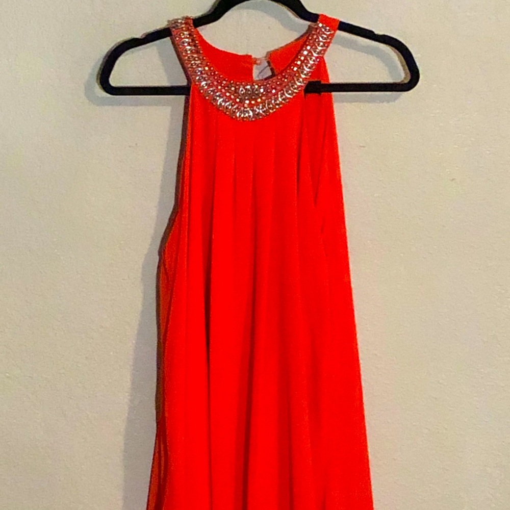 Reddish orange dress with bead decor on neckline